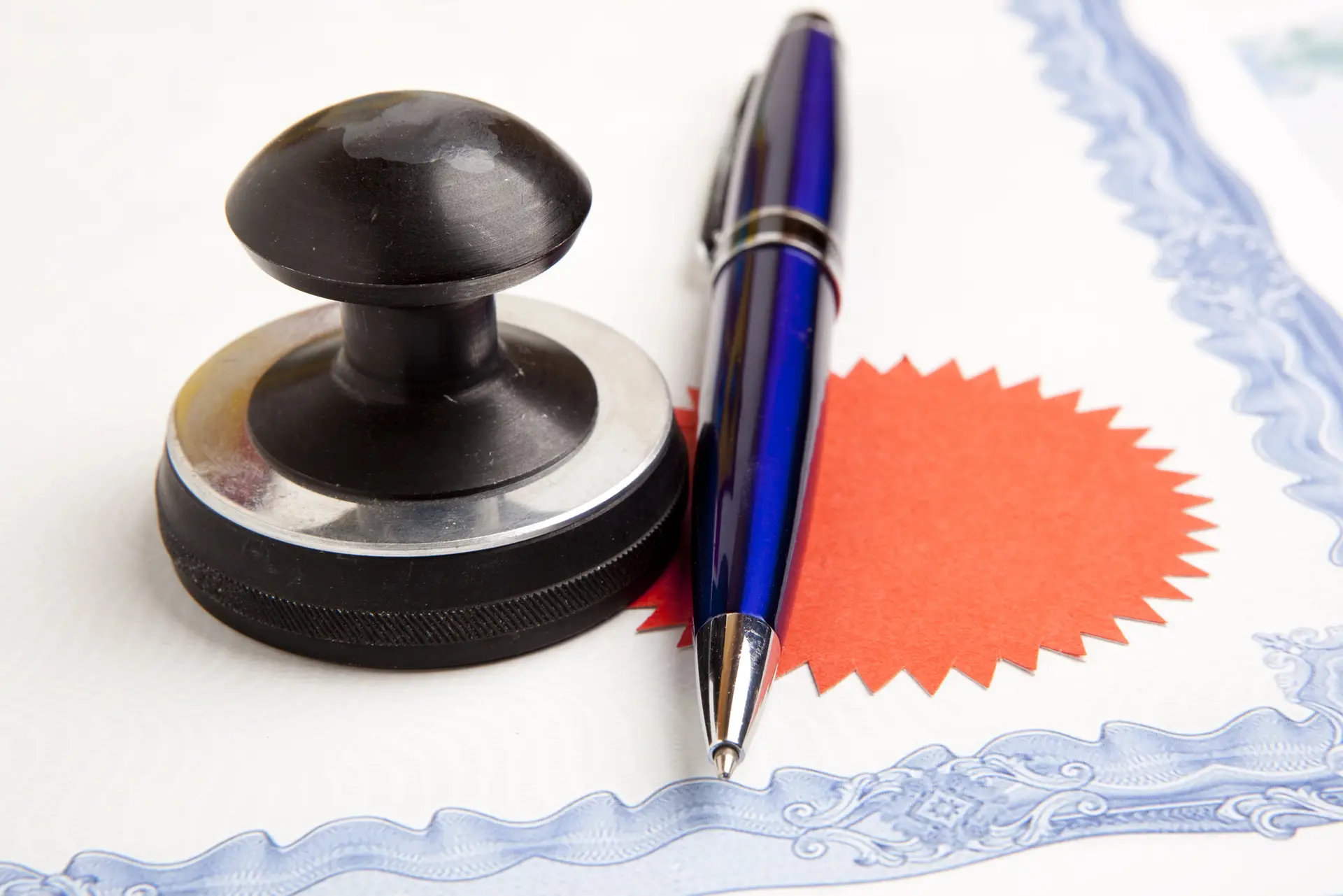 Notary stamp and pen placed on a certified legal document in Phillipsburg, NJ