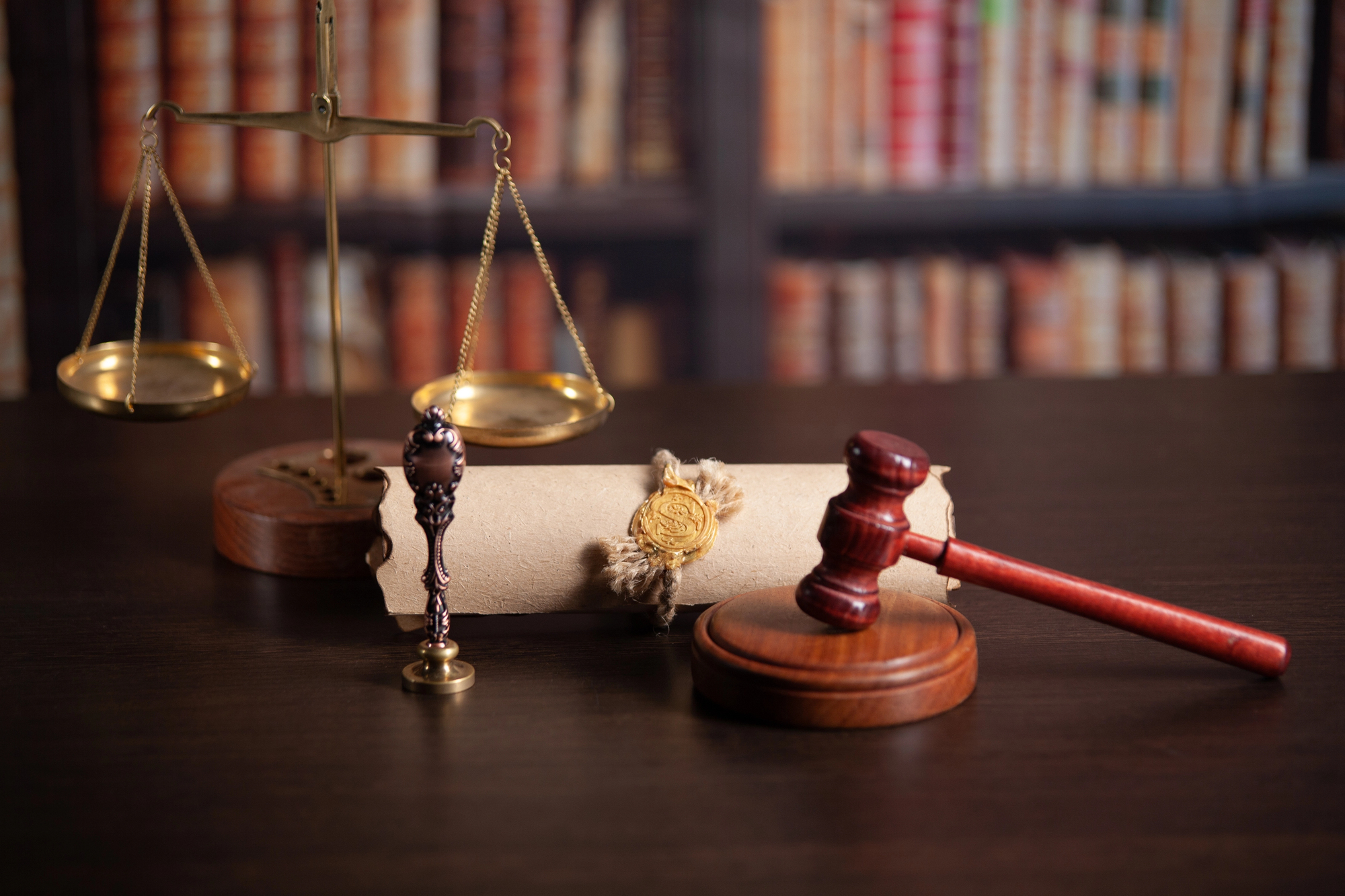 Gavel, justice scale, and sealed legal scroll representing notarized documents in Hope New Jersey
